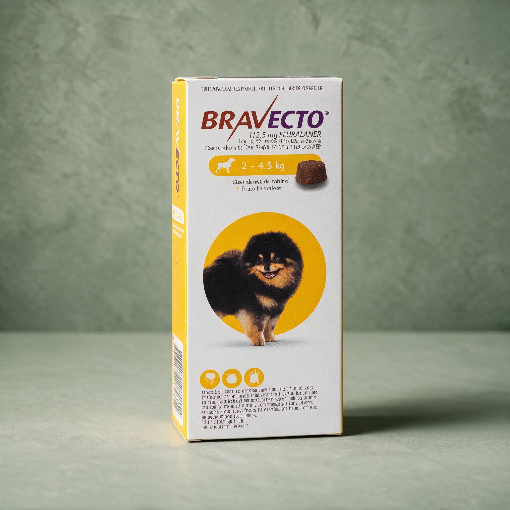 Yellow-accented Bravecto Chewable Tablets for Dogs box, 2-4.5kg pack (112.5mg fluralaner), with the Bravecto logo, a round brown chewable tablet illustration, and a dog silhouette on the front panel.