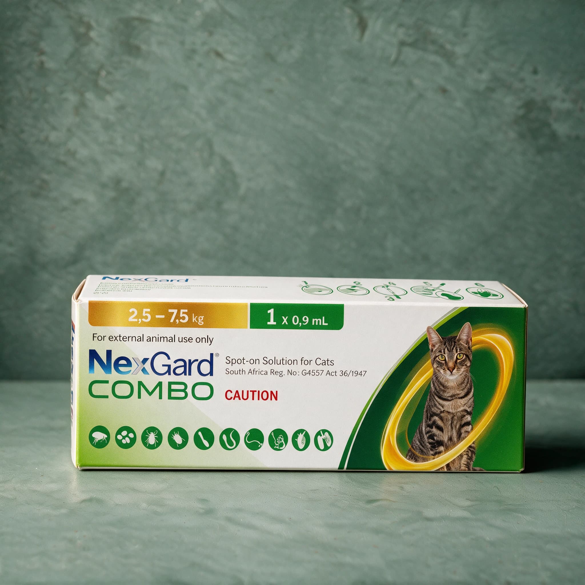 White box of NexGard Combo Spot-on Solution for Cats, 2.5-7.5kg (yellow) pack, with the NexGard Combo logo, a row of parasite icons, and a cat photo with a yellow ring graphic on the front panel.