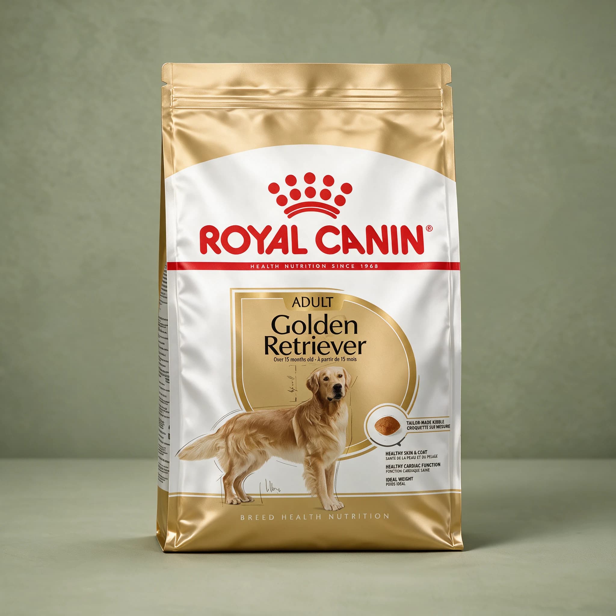 A cream and gold Royal Canin bag printed with a Golden Retriever illustration and labeled "Golden Retriever Adult," standing upright against a sage green studio background.