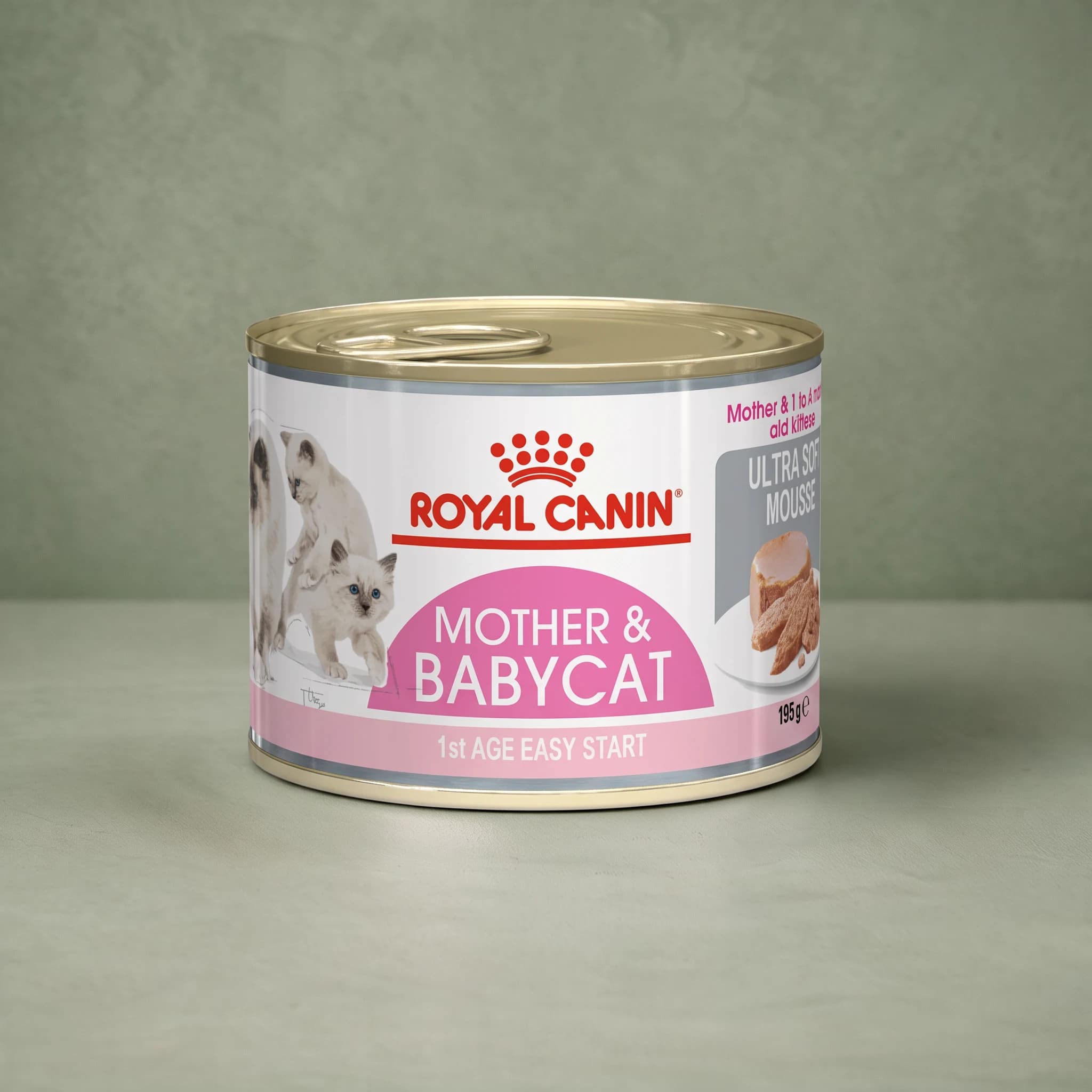 A Royal Canin Mother and Babycat Ultra Soft Mousse wet cat food pack with the soft mousse texture pictured on the label, photographed against a plain sage green studio background.